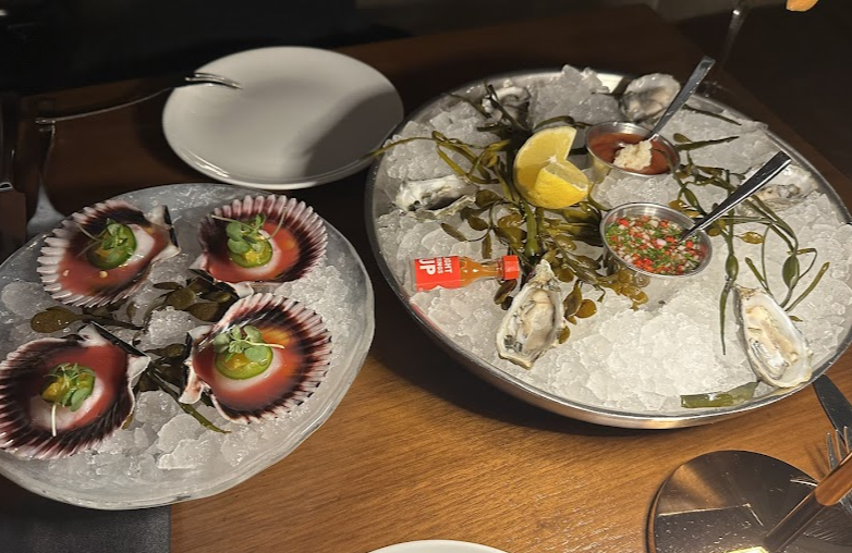 CUT by Wolfgang Puck signature dishes Oysters on the Half Shell
American Wagyu Beef Sliders
Dry Aged Rib Eye